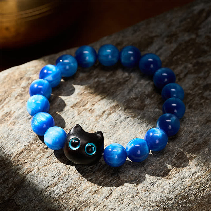 Buddha Stones Pulsera de equilibrio con forma de gato, cuentas de resina azul y madera de ébano. - image 3