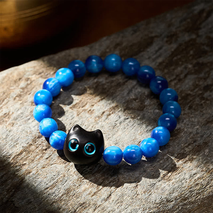 Buddha Stones Pulsera de equilibrio con forma de gato, cuentas de resina azul y madera de ébano. - image 12