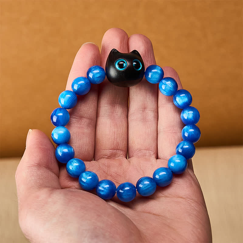 Buddha Stones Pulsera de equilibrio con forma de gato, cuentas de resina azul y madera de ébano. - image 14