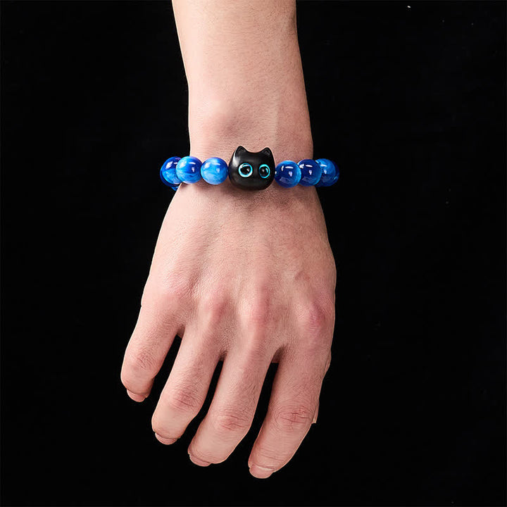 Buddha Stones Pulsera de equilibrio con forma de gato, cuentas de resina azul y madera de ébano. - image 4