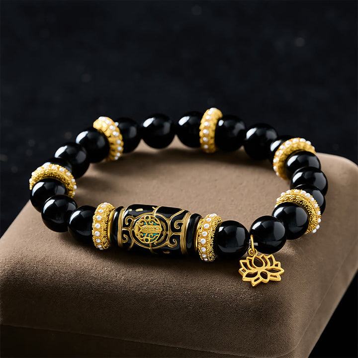 Buddha Stones Colgante de loto con cuentas cilíndricas de resina de obsidiana negra y pulsera de cuentas redondas de protección - image 1