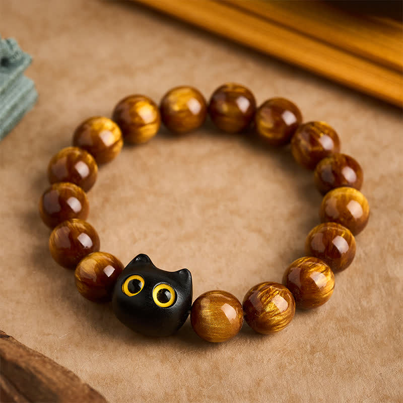 Buddha Stones Pulsera con cuentas de resina amarilla, ojos amarillos y diseño de gato tranquilo en madera de ébano. - 14 mm (circunferencia de la muñeca: 7,1-7,5 pulgadas / 18-19 cm) - image 0