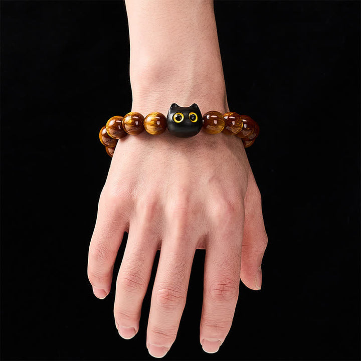 Buddha Stones Pulsera con cuentas de resina amarilla, ojos amarillos y diseño de gato tranquilo en madera de ébano. - image 4
