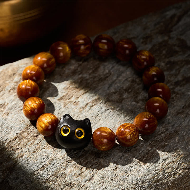 Buddha Stones Pulsera con cuentas de resina amarilla, ojos amarillos y diseño de gato tranquilo en madera de ébano. - image 3