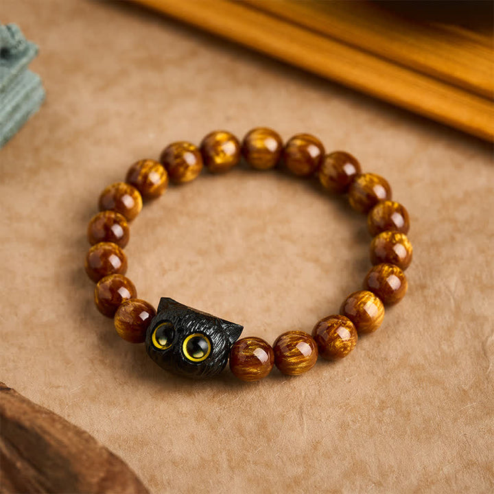 Buddha Stones Pulsera de madera de ébano con cuentas de resina amarilla y gato de la paz - 10 mm (circunferencia de la muñeca: 6,3-6,7 pulgadas / 16-17 cm) - image 0