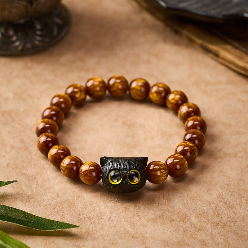 Buddha Stones Pulsera de madera de ébano con cuentas de resina amarilla y gato de la paz - image 1