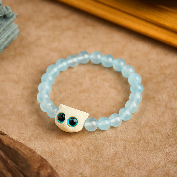 Buddha Stones Pulsera de poder con forma de gato frutal de calcedonia azul marfil - image 1