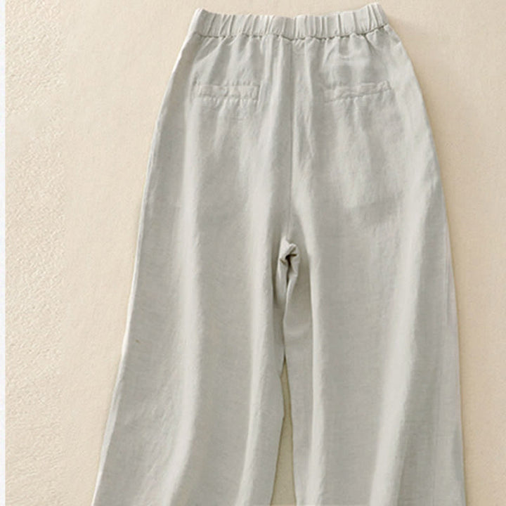 Pantalones de mujer con Buddha Stones, color liso, cierre frontal, cintura elástica y bolsillos. - image 3