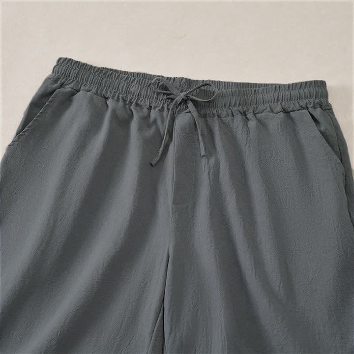 Buddha Stones Pantalones cortos de verano informales de algodón liso con cordón ajustable y bolsillos para hombre. - image 9