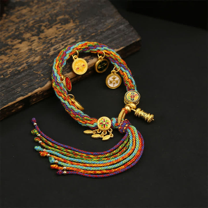 Buddha Stones Pulsera con borla de cuerda trenzada arcoíris Om Mani Padme Hum Sabiduría - Cinco dioses de la riqueza (circunferencia de la muñeca: 5,5–7,5 pulgadas / 14–19 cm) - image 0
