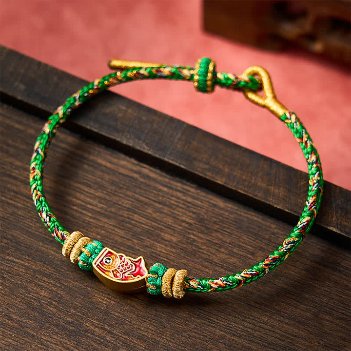 Buddha Stones Pulsera de cuerda tejida a mano con diseño de pez koi. - image 1