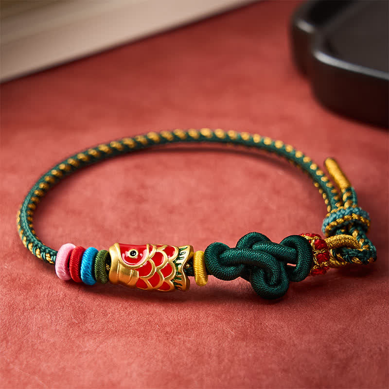 Buddha Stones Pulsera de protección tejida a mano con hilo verde oscuro y amarillo y diseño de pez koi rojo. - image 2