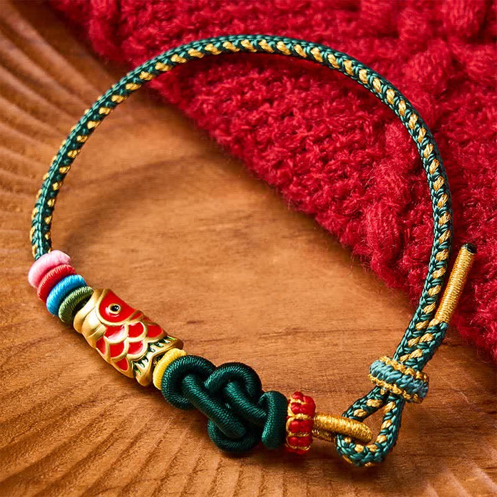 Buddha Stones Pulsera de protección tejida a mano con hilo verde oscuro y amarillo y diseño de pez koi rojo. - Verde (Circunferencia de la muñeca: 5,9-7,1 pulgadas / 15-18 cm) - image 0
