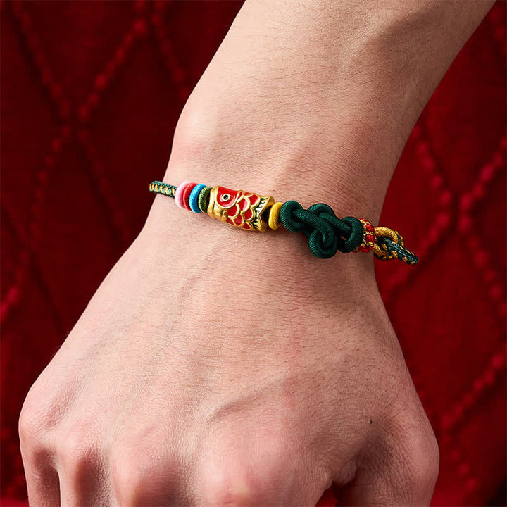 Buddha Stones Pulsera de protección tejida a mano con hilo verde oscuro y amarillo y diseño de pez koi rojo. - image 5