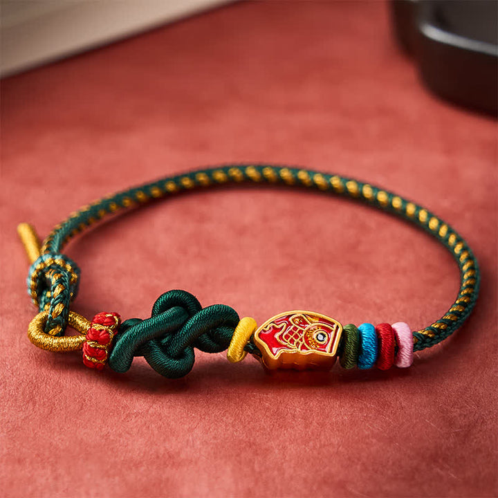 Buddha Stones Pulsera de cuerda protectora con diseño de pez koi, tejida a mano en color verde. - image 2