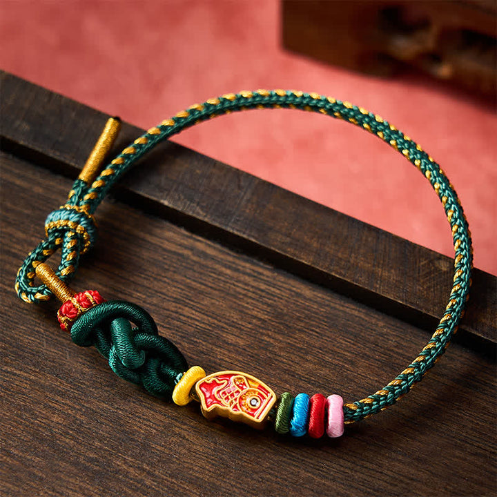 Buddha Stones Pulsera de cuerda protectora con diseño de pez koi, tejida a mano en color verde. - image 1