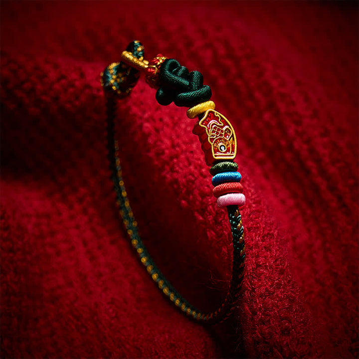 Buddha Stones Pulsera de cuerda protectora con diseño de pez koi, tejida a mano en color verde. - image 3