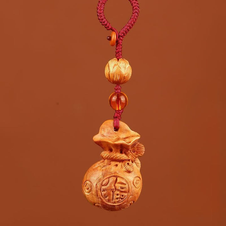 Buddha Stones Llaveros con dije de loto y bolsa de la suerte de madera de durazno Fu - Cuerda roja de loto - image 9