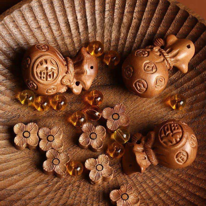 Buddha Stones Llaveros con dije de loto y bolsa de la suerte de madera de durazno Fu - image 12