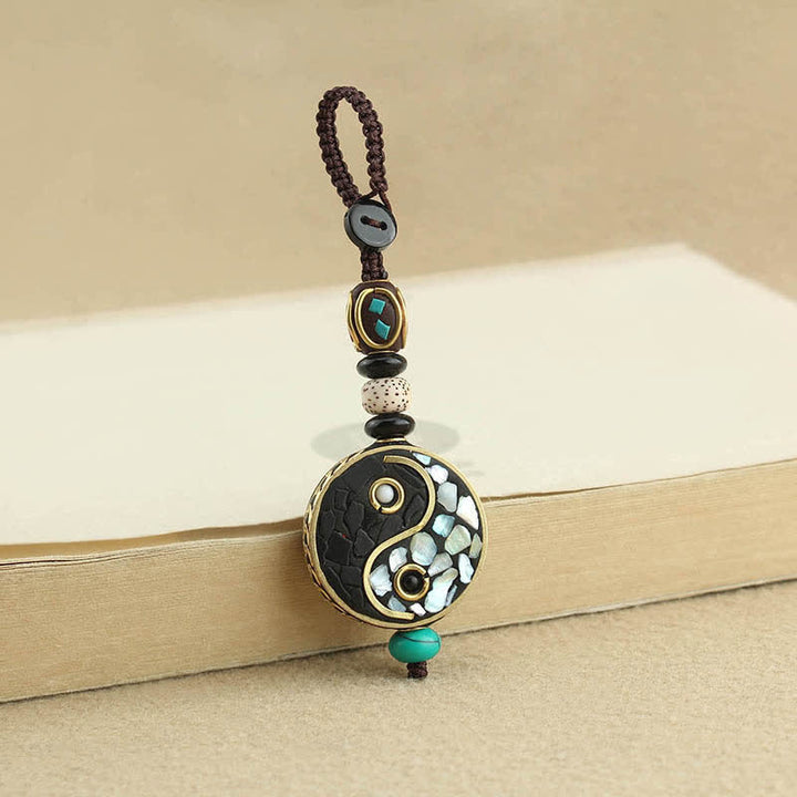 Buddha Stones Llaveros con colgante Yin Yang de madera de wengué - image 1