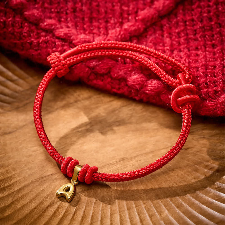 Buddha Stones Pulsera Faith de acero de titanio con letra roja - image 2