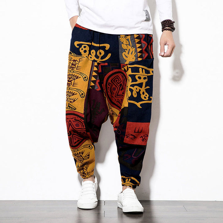 Pantalones Buddha Stones para hombre con estampado de pájaros y grafiti en tonos rojizos y marrones, con bolsillos. - image 1