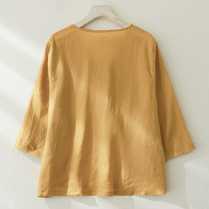 Camisa casual de manga tres cuartos para mujer con bordado de plantas y diseño de Buddha Stones. - image 14