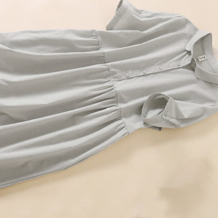 Vestido midi de manga corta con bolsillos, diseño de botones y estampado de Buddha Stones para el verano. - image 9