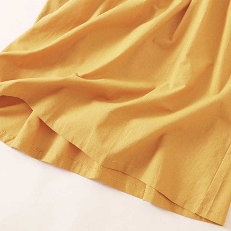 Vestido midi de manga corta con bolsillos, diseño de botones y estampado de Buddha Stones para el verano. - image 21