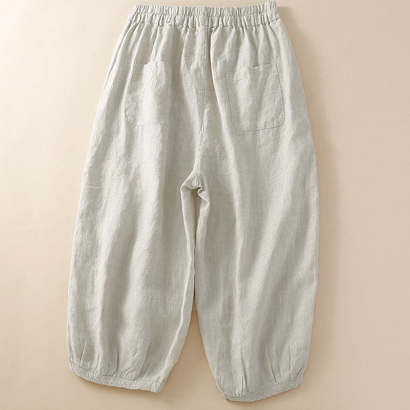 Pantalones harem holgados con cordón ajustable, estampado floral y Buddha Stones, color liso. - image 1