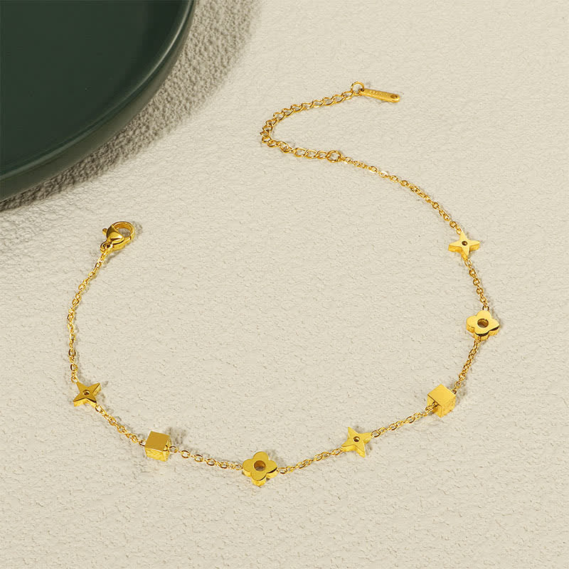 Buddha Stones Tobillera elegante de acero de titanio con dije floral y efecto estimulante. - image 1