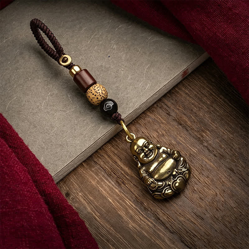 Buddha Stones Llaveros trenzados de latón con diseño de Buda sonriente para atraer la buena suerte y conectar con la tierra. - image 1