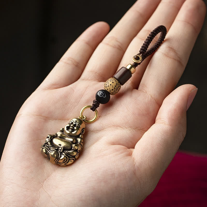Buddha Stones Llaveros trenzados de latón con diseño de Buda sonriente para atraer la buena suerte y conectar con la tierra. - image 2