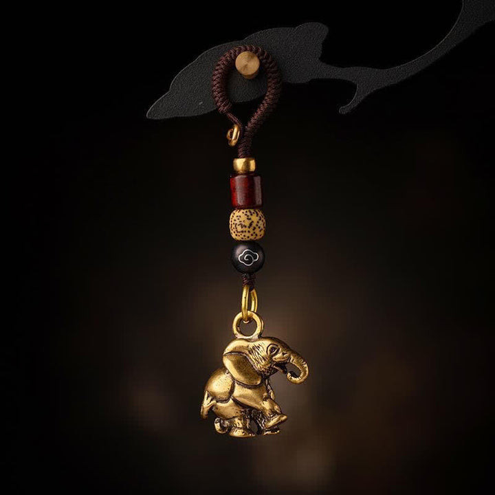 Buddha Stones Llaveros de la suerte con forma de elefante y cinco monedas de emperador, de latón antiguo. - Elefante con cordón de nube auspicioso - image 0