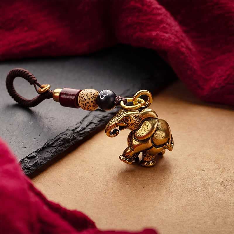 Buddha Stones Llaveros de la suerte con forma de elefante y cinco monedas de emperador, de latón antiguo. - image 1