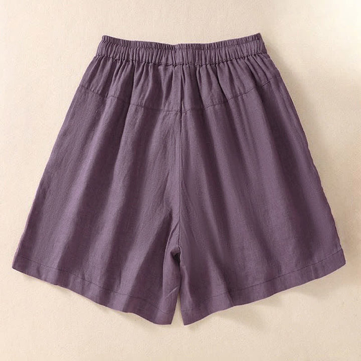 Pantalones cortos de mujer con cordón ajustable, bolsillos y estampado floral informal de Buddha Stones. - image 1