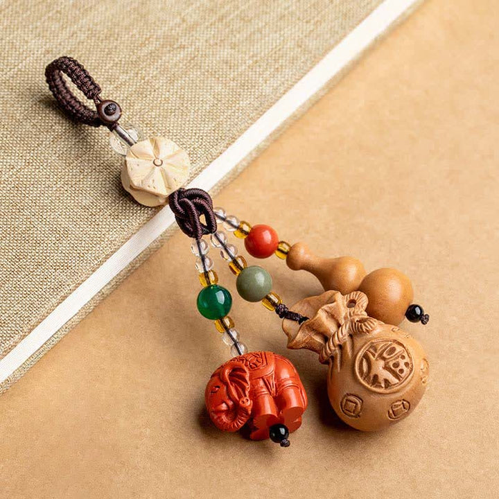 Buddha Stones Llaveros de calabaza de loto con forma de bolsa de dinero con personajes de madera de durazno Fu - Madera de durazno (Protección ♥ Purificación) - image 0