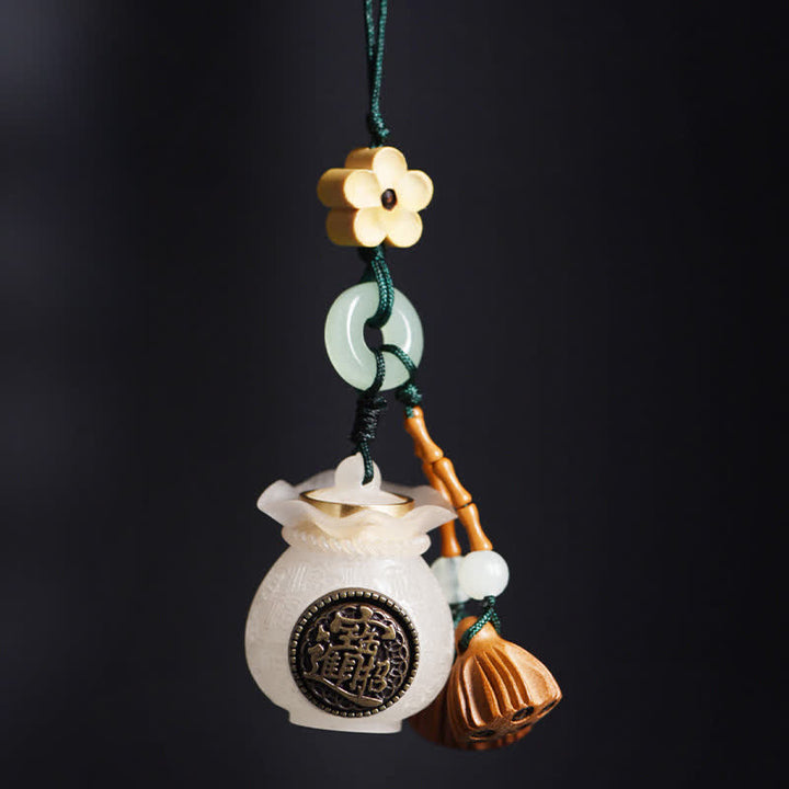 Buddha Stones Llaveros con borla de vaina de loto de madera de durazno para atraer la riqueza y la buena fortuna. - Bolsa de dinero - image 0