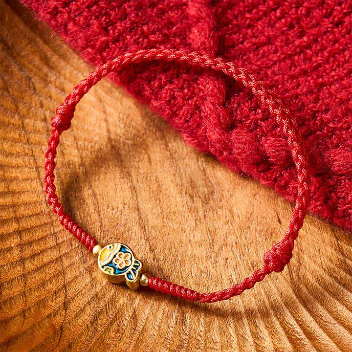 Buddha Stones Pulsera de cuerda roja con diseño de flor cian y pez koi, tejida a mano. - image 1