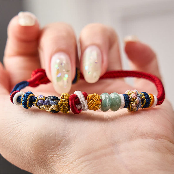 Buddha Stones Pulsera de hilo rojo y azul marino con cuentas de jade y flor de durazno tejida a mano - image 3