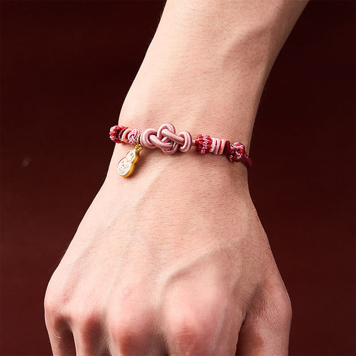 Buddha Stones Pulsera de hilo rosa con la frase "Hazte rico rápidamente" tejida a mano con la frase "Refuerza tu calabaza" - image 4