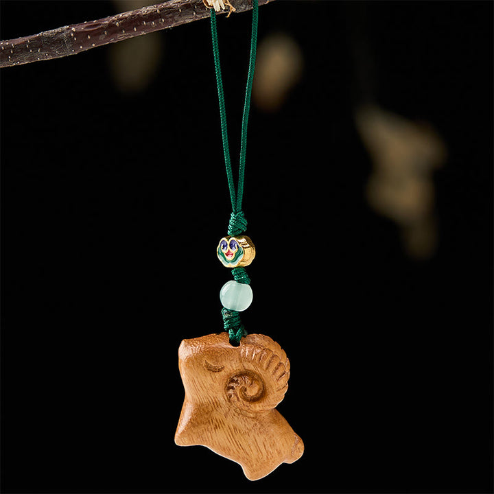 Buddha Stones Llaveros con la imagen de una cabra tallada a mano en madera de sándalo. - image 9