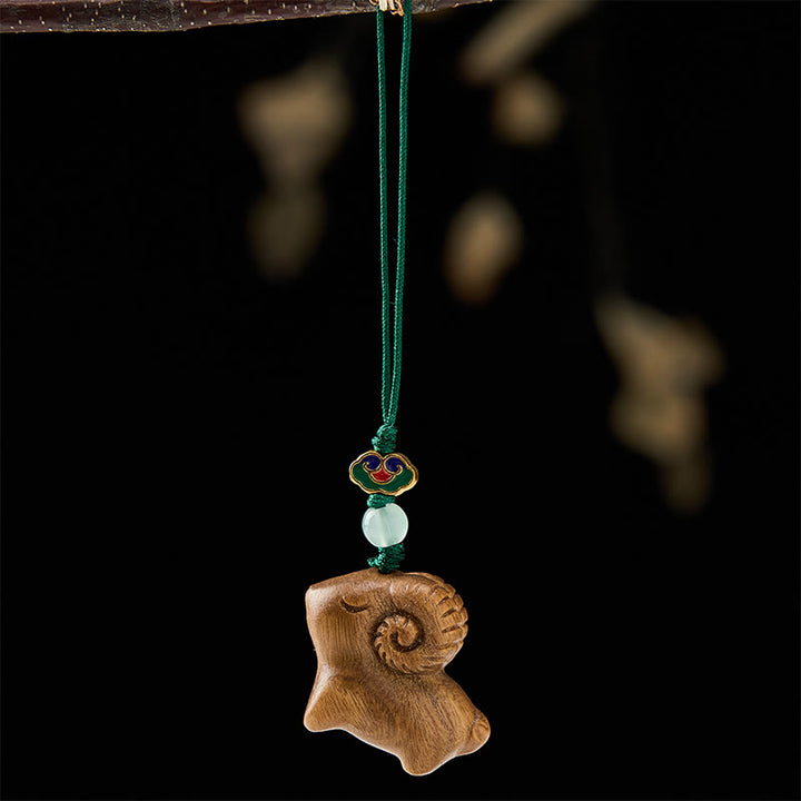 Buddha Stones Llaveros con la imagen de una cabra tallada a mano en madera de sándalo. - image 2