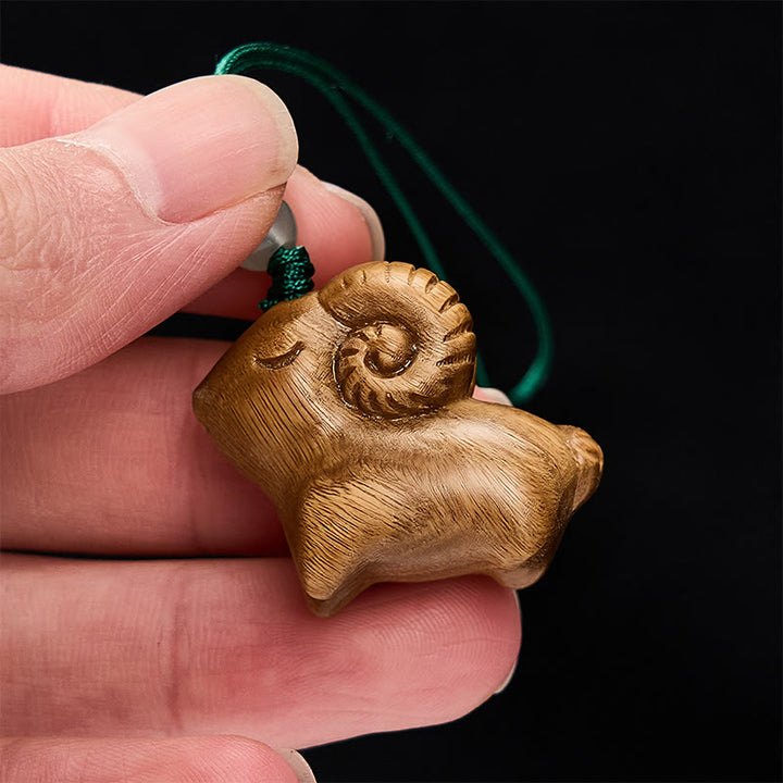 Buddha Stones Llaveros con la imagen de una cabra tallada a mano en madera de sándalo. - image 4