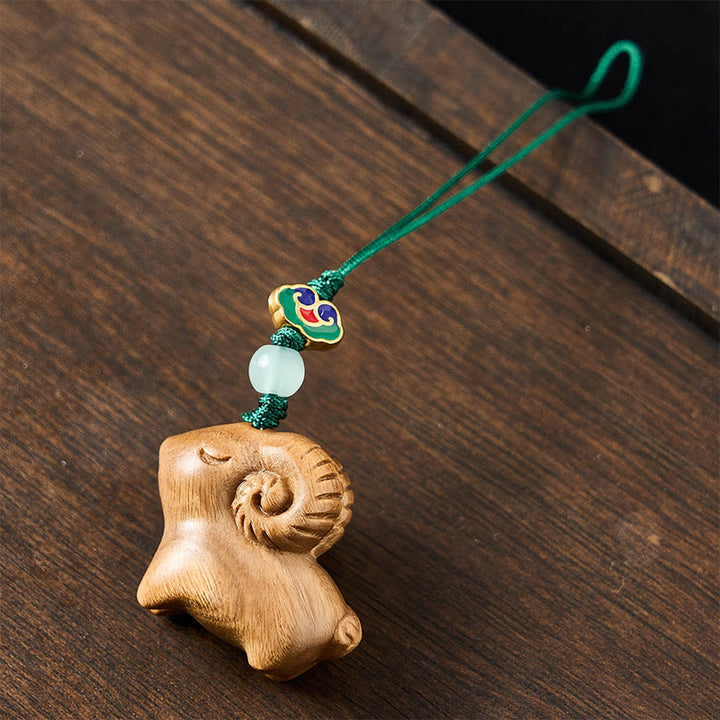 Buddha Stones Llaveros con la imagen de una cabra tallada a mano en madera de sándalo. - image 10
