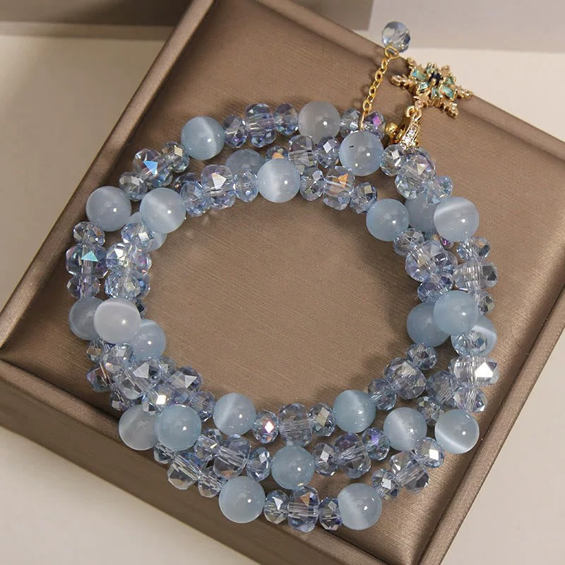 Buddha Stones Pulsera con dije de bendición de copo de nieve azul ojo de gato de triple vuelta - image 8