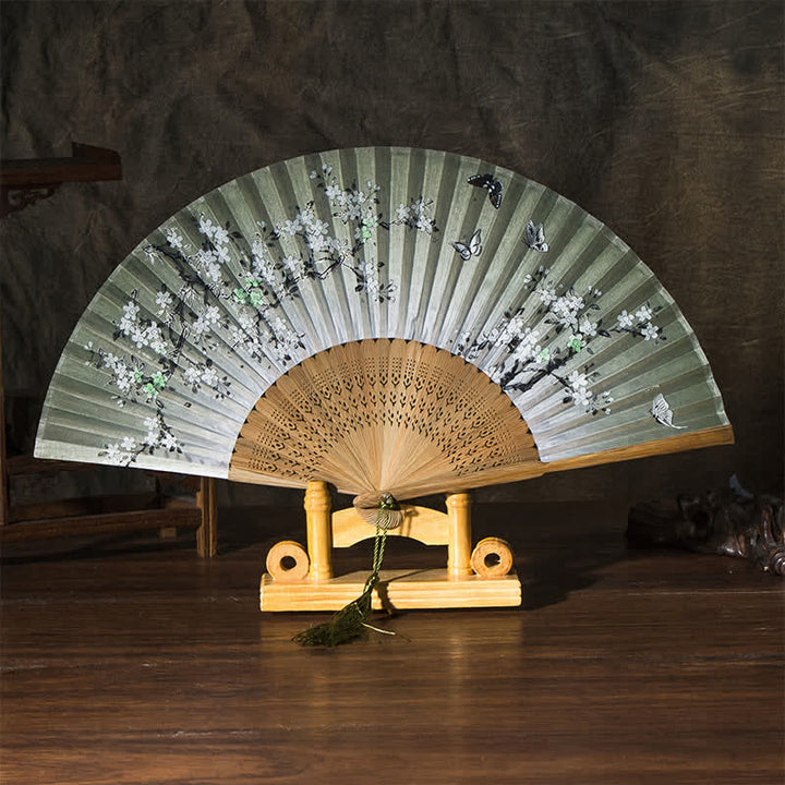 Buddha Stones Ventilador plegable de bambú con mariposas y flores de cerezo. - Superficie verde (borla de cortesía) - image 1