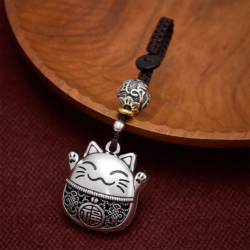 Buddha Stones Llaveros trenzados de cobre grabados con el personaje Fu y el gato de la suerte. - Gato de la suerte plateado - image 0