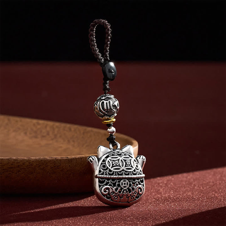 Buddha Stones Llaveros trenzados de cobre grabados con el personaje Fu y el gato de la suerte. - image 2