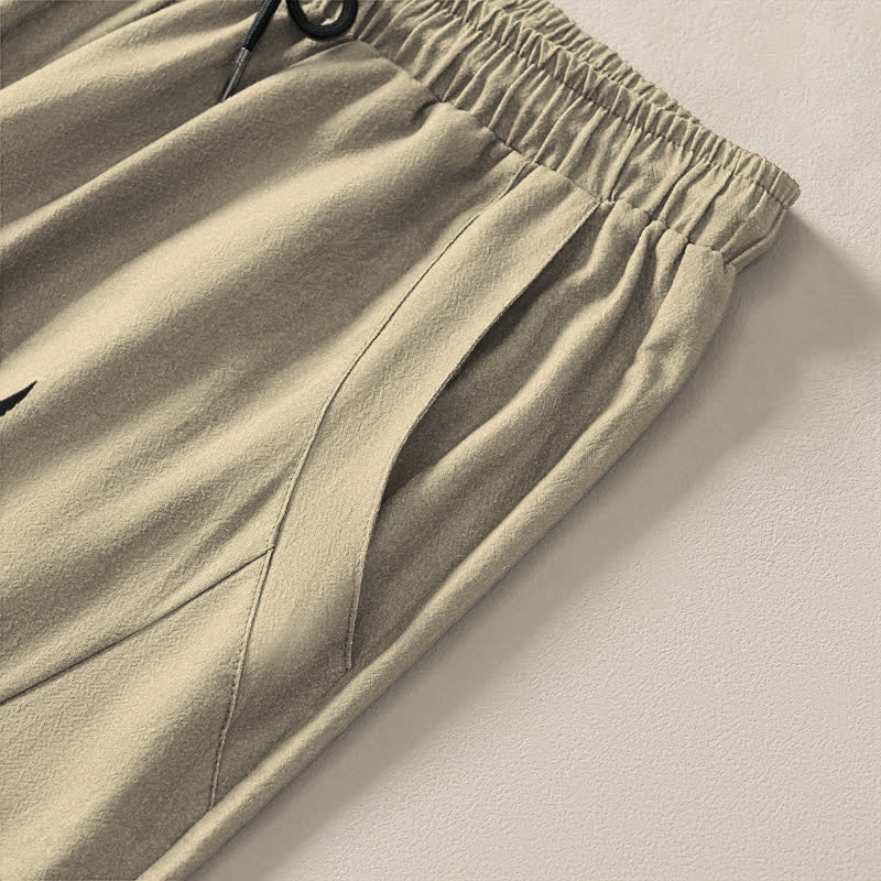 Buddha Stones Pantalones de hombre de algodón puro con estampado tribal de sol, cordón ajustable y corte cónico, con bolsillos. - image 4